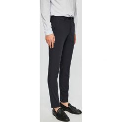 Premium by Jack&Jones - Spodnie. Niebieskie spodnie męskie Premium by Jack&Jones, bez wzorów, z elastanu, eleganckie. W wyprzedaży za 159,90 zł.