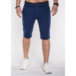 KRÓTKIE SPODENKI MĘSKIE BERMUDY P402 - GRANATOWE. Niebieskie spodenki i szorty męskie Ombre Clothing, s, bez wzorów, z bawełny, krótkie. Za 49,00 zł.