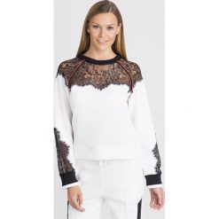 BLUZA PINKO Z KORONKĄ. Białe bluzy damskie Pinko, w koronkowe wzory, z bawełny, bez rękawów, bez kaptura. Za 668,50 zł.