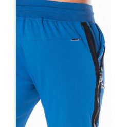 KRÓTKIE SPODENKI MĘSKIE DRESOWE W054 - NIEBIESKIE. Niebieskie spodenki dresowe męskie marki Ombre Clothing, s, krótkie. Za 24,99 zł.