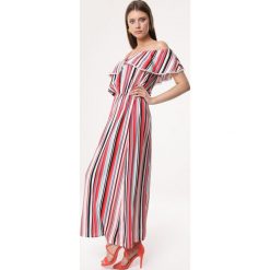 Czerwona Sukienka Jig. Czerwone sukienki damskie Born2be, s, bez wzorów, eleganckie, bez kołnierzyka, bez rękawów, maxi, sportowe. Za 79,99 zł.