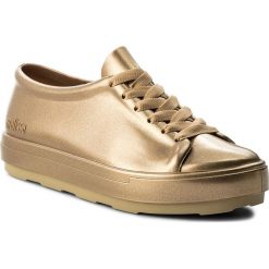 Półbuty MELISSA - Be Shine Ad 32369 Gold 19701. Żółte półbuty damskie Melissa, z tworzywa sztucznego, na płaskiej podeszwie. W wyprzedaży za 249,00 zł.