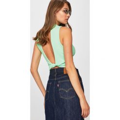 Tally Weijl - Top. Pomarańczowe bluzki damskie TALLY WEIJL, s, bez wzorów, z elastanu, z golfem. Za 49,90 zł.