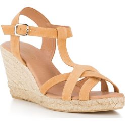 Buty damskie. Żółte koturny damskie Wittchen, w paski, ze skóry, bez obcasa. W wyprzedaży za 229,90 zł.