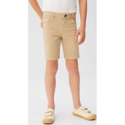 Mango Kids - Szorty dziecięce Perub 116-164 cm. Białe spodenki chłopięce Mango Kids, bez wzorów, z elastanu, casualowe. W wyprzedaży za 45,90 zł.