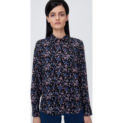 Wzorzysta koszula - Niebieski. Niebieskie koszule damskie Sinsay, s, bez wzorów, bez kołnierzyka, bez rękawów. Za 39,99 zł.