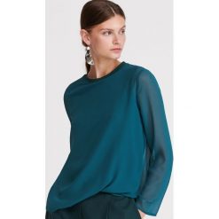 Gladka bluzka - Zielony. Zielone bluzki damskie Reserved, bez wzorów, bez kołnierzyka, bez rękawów. Za 119,99 zł.