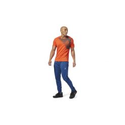Spodnie treningowe Reebok Sport Spodnie Stacked Logo Trackster. Niebieskie spodnie męskie Reebok Sport, s, bez wzorów, sportowe. Za 179,00 zł.
