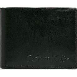 Calvin Klein - Portfel skórzany. Czarne portfele męskie Calvin Klein, bez wzorów, ze skóry. Za 279,90 zł.