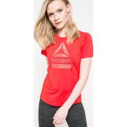 Reebok - Top. Szare topy damskie marki Reebok, s, z nadrukiem, z elastanu, z krótkim rękawem. W wyprzedaży za 99,90 zł.