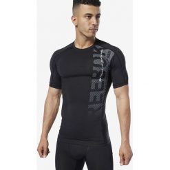Reebok Koszulka Czarny. Czarne podkoszulki męskie Reebok, xxl, bez wzorów, z elastanu, z krótkim rękawem. Za 163,95 zł.