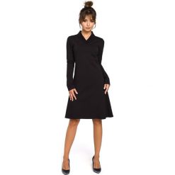 CAROLE Sukienka z klinami i wstawkami ze ściągacza - czarna. Czarne sukienki damskie dzianinowe marki BE, s, eleganckie, oversize. Za 169,00 zł.