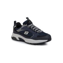 Skechers ALERTNESS 999873 NVY Granatowy. Niebieskie buty sportowe męskie Skechers, ze skóry ekologicznej, bez zapięcia. Za 249,99 zł.