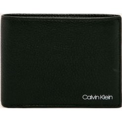 Calvin Klein - Portfel skórzany. Czarne portfele męskie Calvin Klein, bez wzorów, ze skóry. Za 359,90 zł.