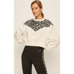 Nike Sportswear - Bluza. Czarne bluzy damskie Nike Sportswear, s, bez wzorów, z elastanu, bez rękawów, bez kaptura. W wyprzedaży za 179,90 zł.