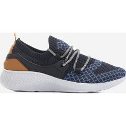 Granatowe Buty Sportowe Effectiveness. Niebieskie buty sportowe męskie Born2be, bez zapięcia. W wyprzedaży za 79,99 zł.