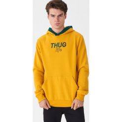 Bluza z haftem - Żółty. Żółte bluzy męskie House, s, z haftami, bez kołnierzyka, bez rękawów, bez kaptura. Za 119,99 zł.
