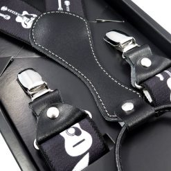 Czarne szelki męskie w białe gitary SZ65. Czarne szelki męskie Modini Moda Męska. W wyprzedaży za 48,60 zł.