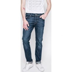 Diesel - Jeansy Buster. Niebieskie jeansy męskie regular marki Diesel, z bawełny. W wyprzedaży za 329,90 zł.