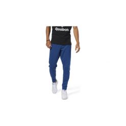Spodnie treningowe Reebok Classic Spodnie dresowe Classics Advanced. Niebieskie bez kategorii Reebok Classic, z dresówki. Za 279,00 zł.