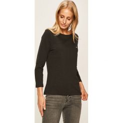 Calvin Klein - Longsleeve. Białe bluzki damskie Calvin Klein, s, bez wzorów, z bawełny, casualowe, z okrągłym kołnierzem, z długim rękawem. W wyprzedaży za 99,90 zł.