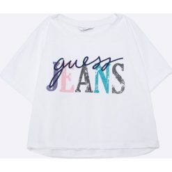 Guess Jeans - Top dziecięcy 118-175 cm. Szare bluzki dziewczęce marki Guess Jeans, z nadrukiem, z bawełny, z okrągłym kołnierzem, z krótkim rękawem. Za 99,90 zł.