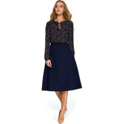 Spódnica lekko rozkloszowana - granatowa. Spódniczki damskie Style, na co dzień, s, bez wzorów, biznesowe, midi, rozkloszowane. Za 107,00 zł.