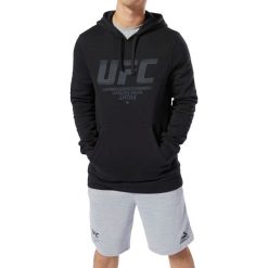 Reebok UFC Fan Gear Pullover Hoodie DQ2005. Czarne bluzy męskie Reebok, xs, bez wzorów, z bawełny, bez kołnierzyka, bez rękawów, bez kaptura. W wyprzedaży za 159,99 zł.
