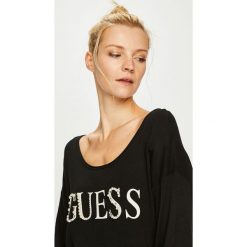 Guess Jeans - Sweter Guia. Czarne swetry klasyczne damskie marki Guess Jeans, s, z aplikacjami, z elastanu, z okrągłym kołnierzem. Za 319,90 zł.