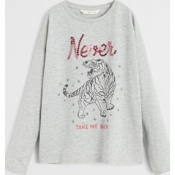 Mango Kids - Longsleeve dziecięcy Tigre 110-164 cm. Szare bluzki dziewczęce Mango Kids, z nadrukiem, z bawełny, z okrągłym kołnierzem, z krótkim rękawem, krótkie, bez kaptura. Za 59,90 zł.