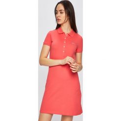 Lacoste - Sukienka. Niebieskie sukienki damskie Lacoste, na co dzień, xs, bez wzorów, z elastanu, casualowe, bez kołnierzyka, z krótkim rękawem, krótkie, mini, proste. W wyprzedaży za 399,90 zł.