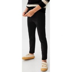 Mango Kids - Spodnie dziecięce Praga 122-164 cm. Czarne spodnie dziewczęce Mango Kids, bez wzorów, z bawełny. Za 45,90 zł.
