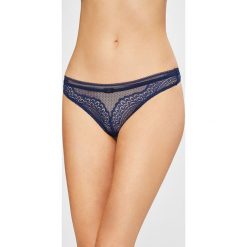 Triumph - Stringi Beauty-Full Darling. Różowe stringi Triumph, z elastanu. W wyprzedaży za 59,90 zł.