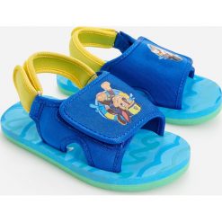 Sandały Psi Patrol - Turkusowy. Niebieskie sandały męskie Reserved, bez zapięcia. Za 39,99 zł.