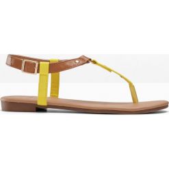 Sandały japonki bonprix koniakowo-żółty. Pomarańczowe klapki damskie bonprix, w paski, bez obcasa. Za 69,99 zł.