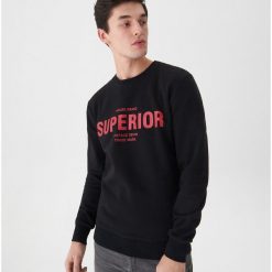 Bluza z napisem - Czarny. Czarne bluzy damskie marki House, s, z napisami, bez rękawów, bez kaptura. Za 69,99 zł.
