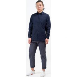 Trussardi Jeans koszula męska 43 ciemnoniebieski. Niebieskie koszule męskie Trussardi Jeans, m, bez wzorów, z jeansu, bez kołnierzyka, bez rękawów. W wyprzedaży za 239,00 zł.