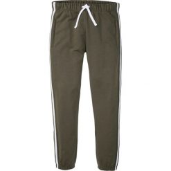 Spodnie sportowe bonprix ciemnooliwkowy. Zielone spodnie męskie bonprix, s, w paski, sportowe. Za 79,99 zł.