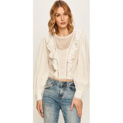 Guess Jeans - Bluzka. Czarne bluzki damskie Guess Jeans, s, z aplikacjami, z jeansu, z okrągłym kołnierzem, z długim rękawem. W wyprzedaży za 269,90 zł.