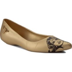 Baleriny MELISSA - Glam + Wonder Woman 32220 Gold 06525. Żółte baleriny damskie Melissa, bez wzorów, z tworzywa sztucznego, bez obcasa, bez zapięcia. W wyprzedaży za 249,00 zł.
