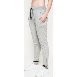 Reebok - Spodnie. Szare spodnie damskie Reebok, s, z bawełny. W wyprzedaży za 149,90 zł.