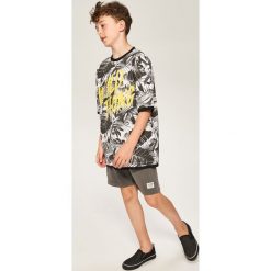 T-shirt z nadrukiem - Czarny. Czarne t-shirty damskie Reserved, s, z nadrukiem, bez kołnierzyka. Za 29,99 zł.