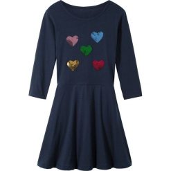Sukienka shirtowa z cekinami bonprix ciemnoniebieski. Niebieskie sukienki dziewczęce marki bonprix, z aplikacjami, z bawełny, eleganckie, bez rękawów. Za 44,99 zł.