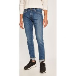 Calvin Klein - Jeansy Melrose Light. Niebieskie jeansy męskie Calvin Klein, z aplikacjami. W wyprzedaży za 299,90 zł.