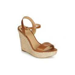 Sandały MICHAEL Michael Kors JILL WEDGE. Pomarańczowe sandały damskie MICHAEL Michael Kors, bez wzorów, bez obcasa, bez zapięcia. Za 519,20 zł.
