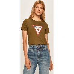 Guess Jeans - T-shirt. Czerwone bluzki damskie Guess Jeans, s, z nadrukiem, z bawełny, casualowe, z okrągłym kołnierzem, z krótkim rękawem. W wyprzedaży za 119,90 zł.