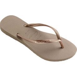 Havaianas - Japonki. Różowe klapki damskie Havaianas, bez wzorów, z materiału, bez obcasa, na obcasie. W wyprzedaży za 79,90 zł.