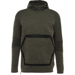 Puma N.R.G. EVOKNIT HOODIE Sweter forest night heather. Zielone swetry klasyczne męskie Puma, m, z materiału. Za 509,00 zł.