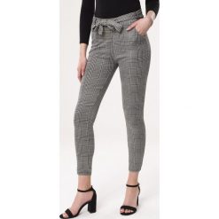 Czarne Spodnie My Time. Czarne spodnie damskie Born2be, xl, bez wzorów, z dzianiny, klasyczne, z standardowym stanem. Za 34,99 zł.
