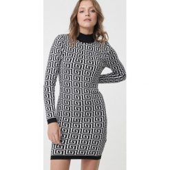 Czarno-Biała Sukienka Leichhardt. Białe sukienki damskie Born2be, s, bez wzorów, z golfem, bez rękawów, mini, dopasowane. Za 119,99 zł.